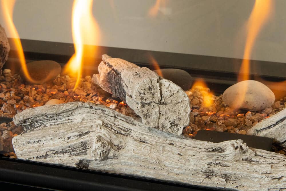 Valor LX1 Pier gas fireplace with driftwood logs