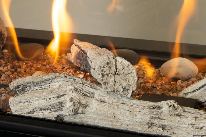 Valor LX1 Pier gas fireplace with driftwood logs