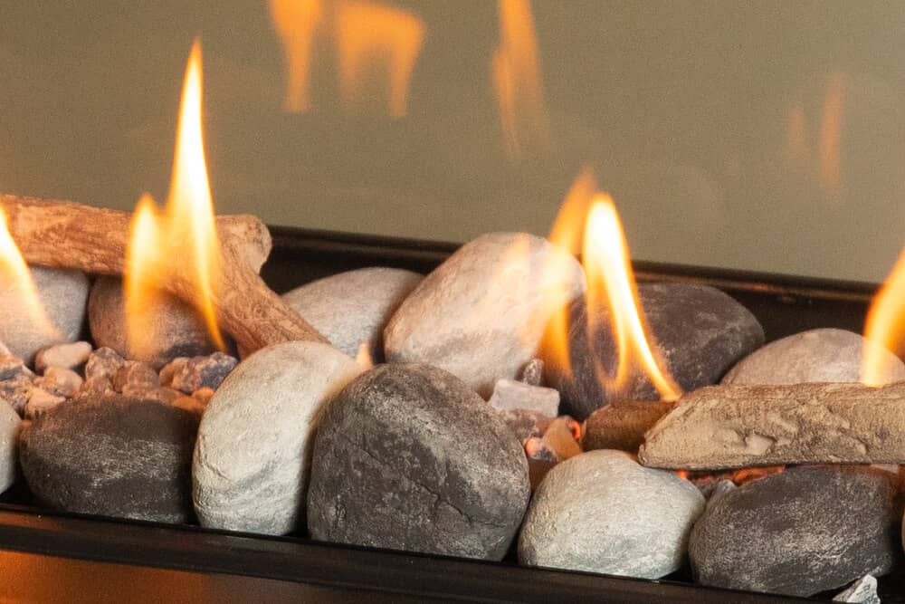 Valor LX1 Pier gas fireplace with rock and shale