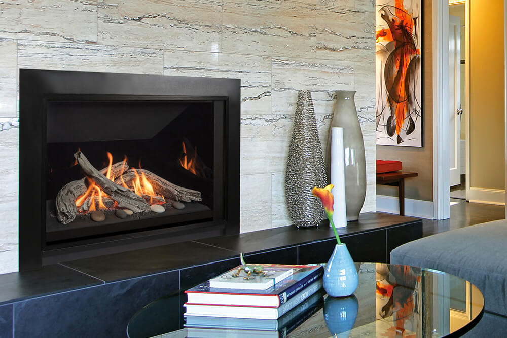 Valor H5 gas fireplace with driftwood and reflective liner