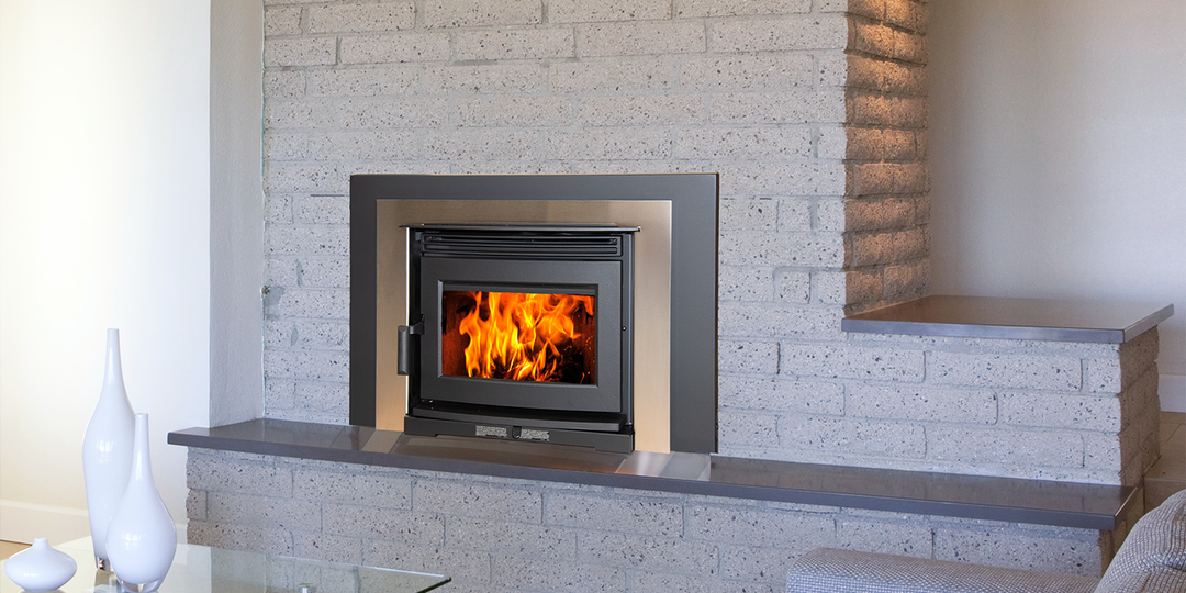 Pacific Energy Neo 1.6 Insert LE2 wood insert in a room setting