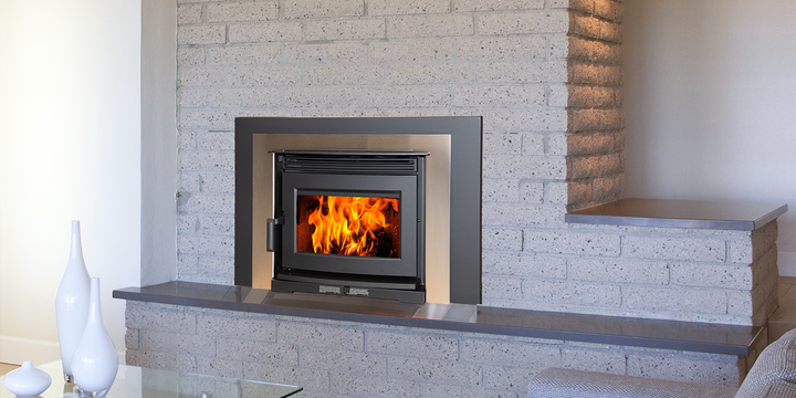 Pacific Energy Neo 1.6 Insert LE2 wood insert in a room setting