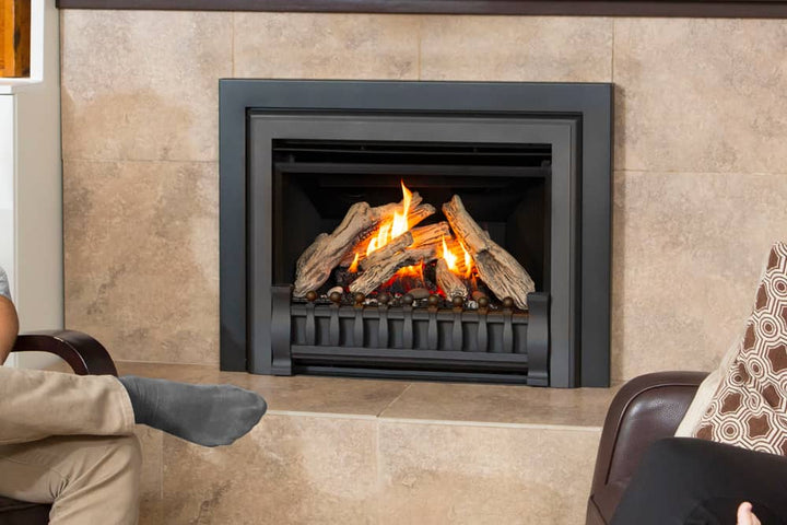 Valor G3 V-Class gas insert with driftwood logs and fluted black liner