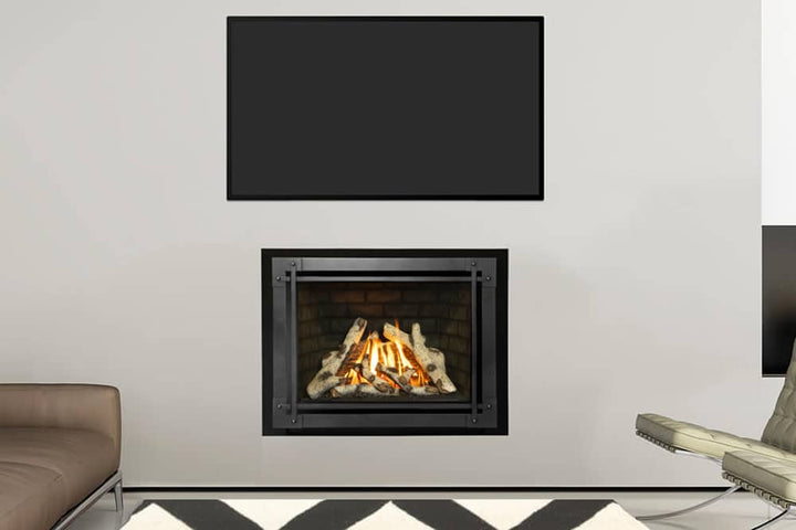 Valor H5 gas fireplace with birch logs and gray brick liner