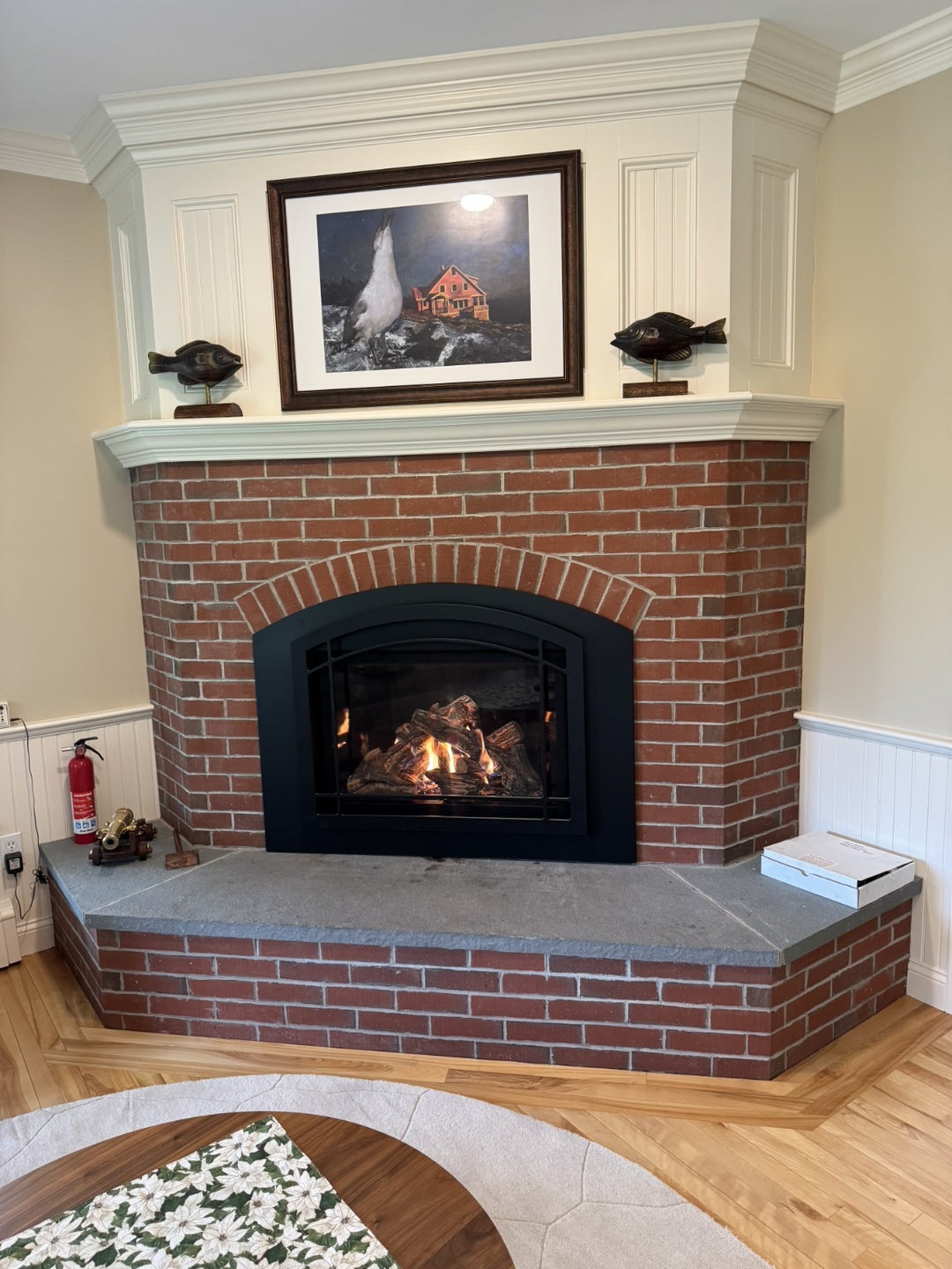 Gas fireplace insert installed by Hearth Doctor in an existing brick fireplace
