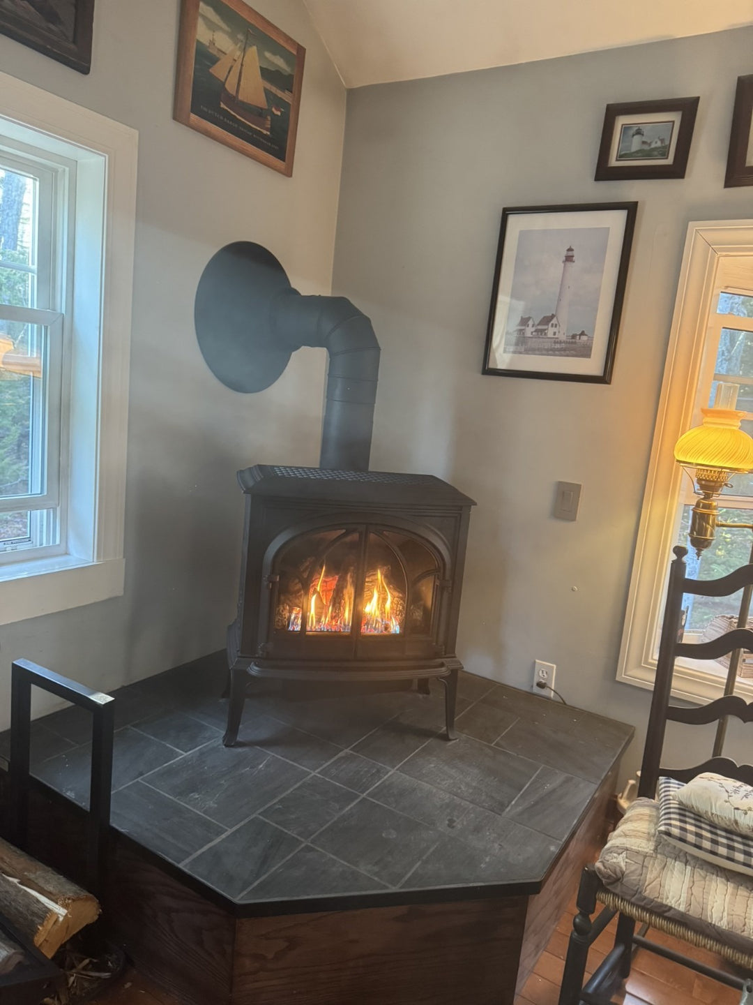 Traditional freestanding stove installation by Hearth Doctor on a corner hearth
