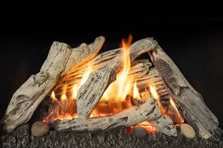 Valor Madrona gas stove with driftwood logs