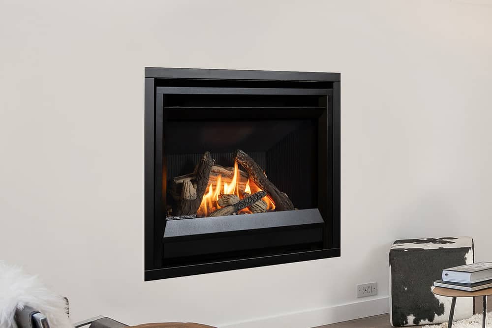 Valor Horizon gas fireplace with traditional logs and fluted black liner