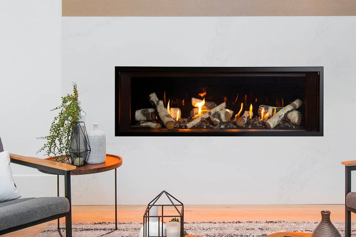 Valor L2 linear gas fireplace with birch logs and reflective glass liner